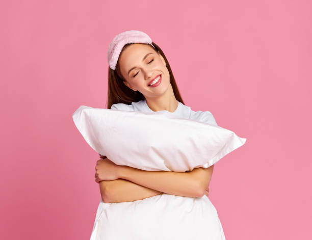 istock Happy young female dreaming about sleep 1313250300