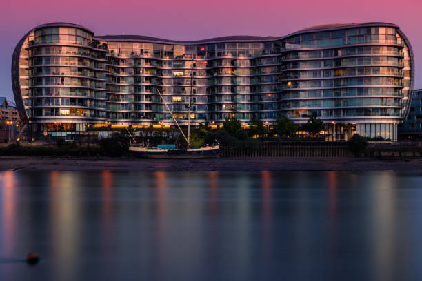 A riverside apartment building at Albion Riverside in London at sunset Long exposure, a riverside apartment building at Albion Riverside in Battersea, London at sunset wandsworth photos stock pictures, royalty-free photos & images