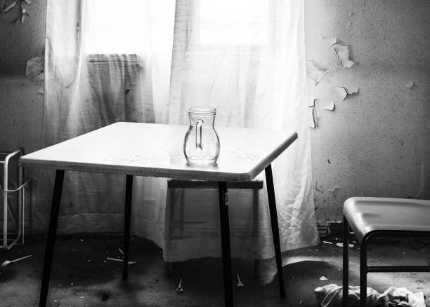 istock Empty pitcher on table in abandoned hospital room 1313251741