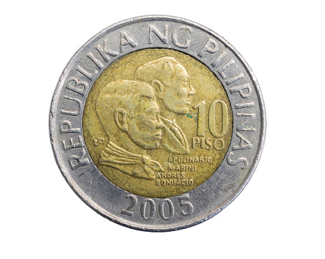 Philippines ten piso coin on white isolated background