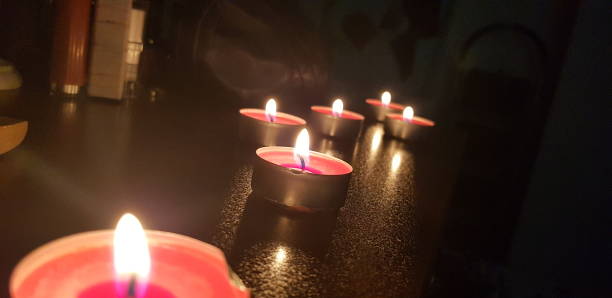 istock lovely romantic atmosphere with round small candles lit 1313252420