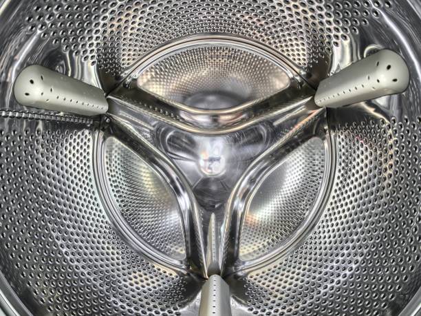 istock Closeup view of washing machine drum. 1313253318