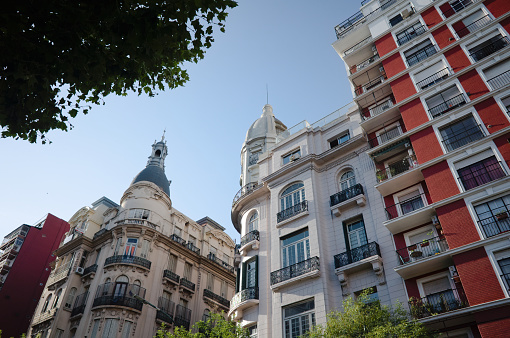 Apartment buildings in classic style located in one of the central areas of Buenos Aires called barrio Balvanera. Typical residential estate in center of Buenos Aires down the street Avenida Rivadavia