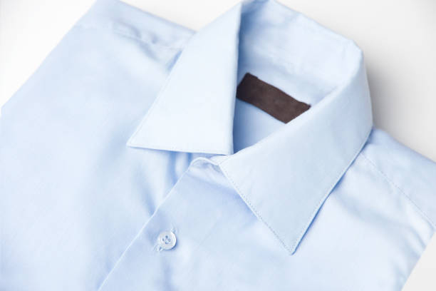 istock Blue shirt isolated on white 1313258413