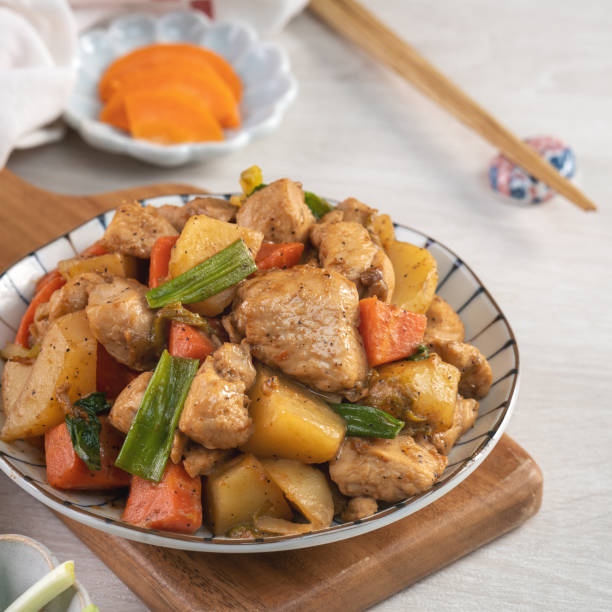 istock Homemade delicious cubed chicken with braised potato chunks. 1313258758