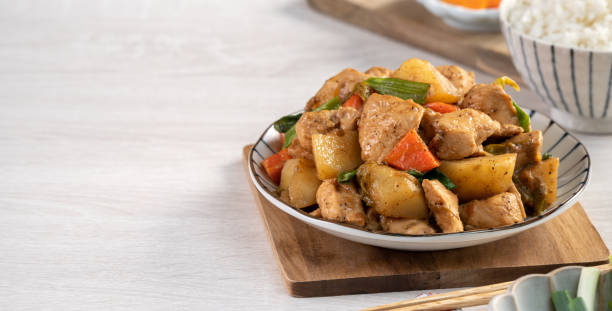 Homemade delicious cubed chicken with braised potato chunks.