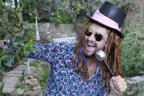 istock Singer with alternative style holding microphone 1313258806