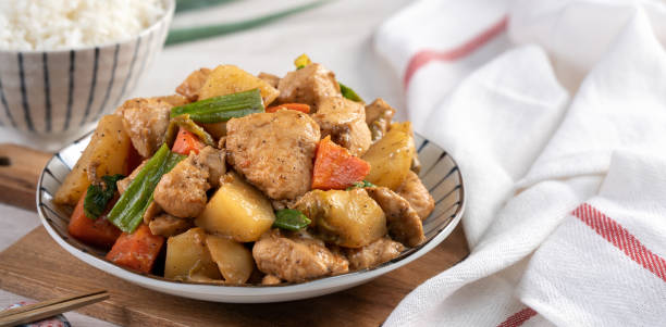 istock Homemade delicious cubed chicken with braised potato chunks. 1313258819
