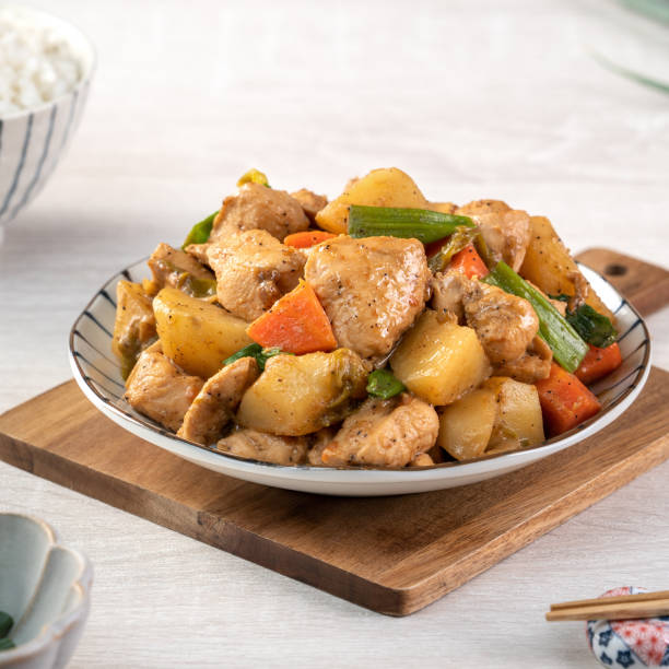 istock Homemade delicious cubed chicken with braised potato chunks. 1313258845
