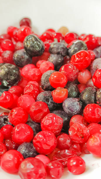 istock Frozen lingonberries and blueberries 1313261250