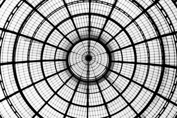 look up at glass dome in the galleria vittorio emanuele ii in milan. geometric detail. - dome milan italy architectural feature italy imagens e fotografias de stock