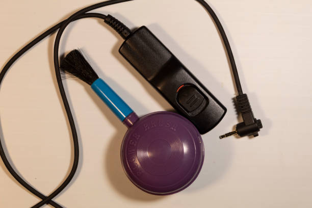 istock a remote shutter button for the camera and a blower brush to blow dust off the lens. 1313267039
