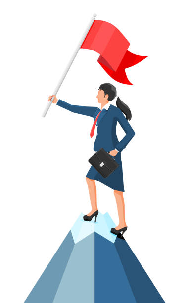 istock Businesswoman on top of mountain with flag. 1313269820
