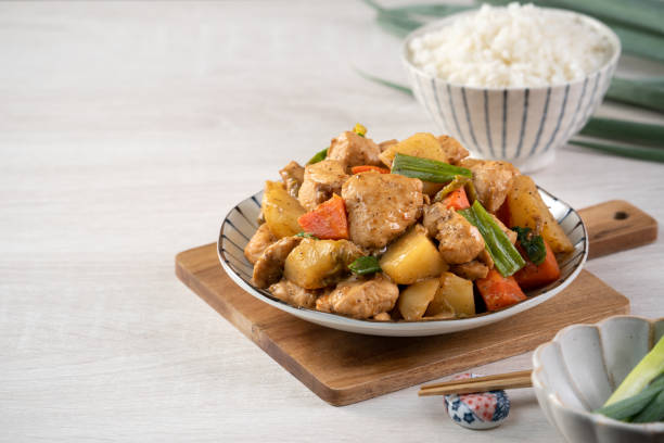 istock Homemade delicious cubed chicken with braised potato chunks. 1313271205