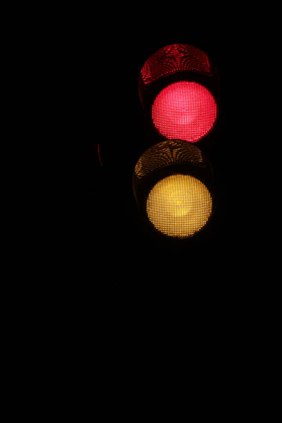 istock Yellow and orange color traffic light 1313271741