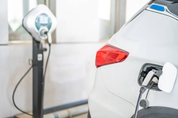 istock Electric car and charging station 1313275716