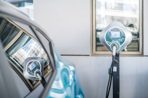 istock Electric car and charging station 1313275938