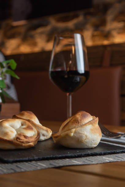 istock Homemade empanadas with a black stone plate 1313278380