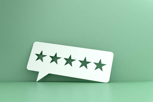 five stars service Big message bubble against a green wall. there are five stars cut out from the message announcement message photos stock pictures, royalty-free photos & images