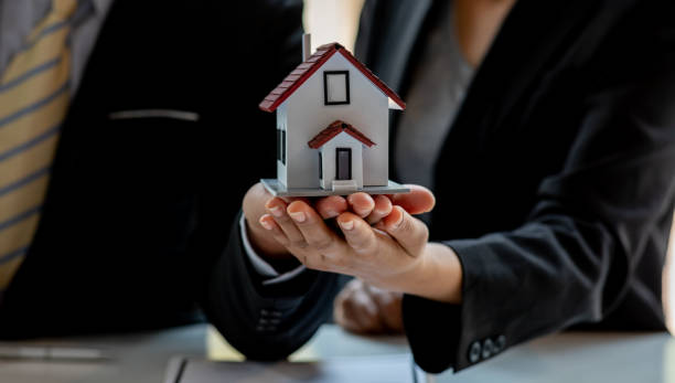 istock Real estate broker agent presenting and consult to customer 1313290614