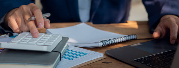 istock financial inspector and secretary making report 1313290666
