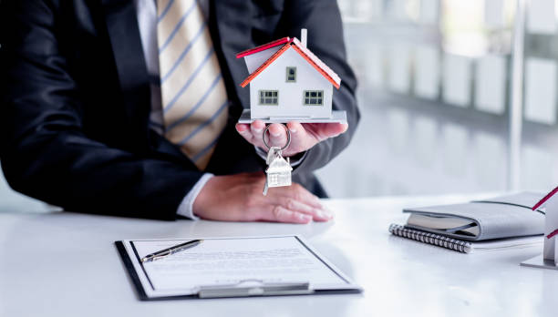 istock Real estate broker agent presenting and consult to customer 1313290714