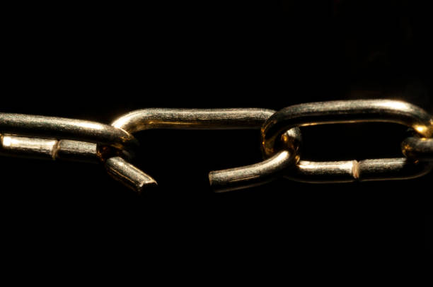 the weak link in the command chain - effort gold indoors studio shot imagens e fotografias de stock