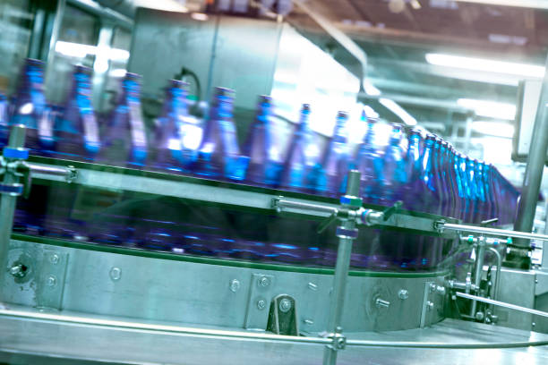 istock Mineral water industry - automatic bottling machine 1313295333