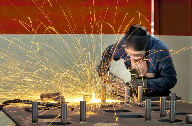 istock industry - worker in action with protection 1313297026