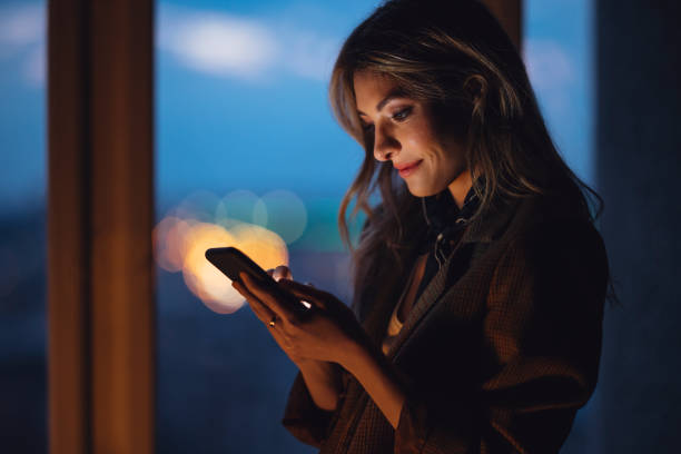 istock Beautiful female entrepreneur using smart phone 1313298572