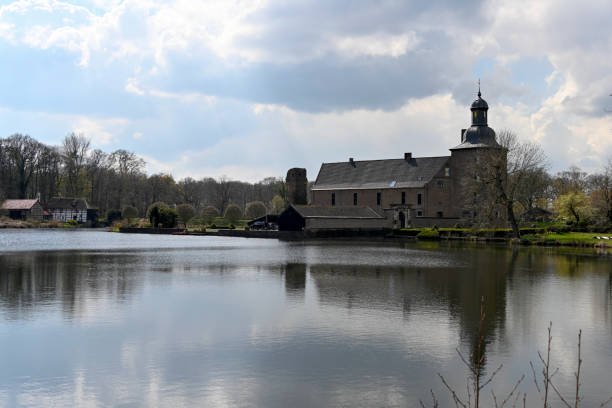 Wegberg, Germany, April 15, 2021 - Tueschenbroich Castle was built as a moated castle and first mentioned in documents in 1172 as Thuschinbroc. The buildings burned down during the Thirty Years' War.