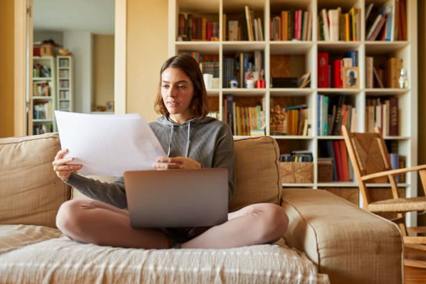 istock One woman working living room 1313300267
