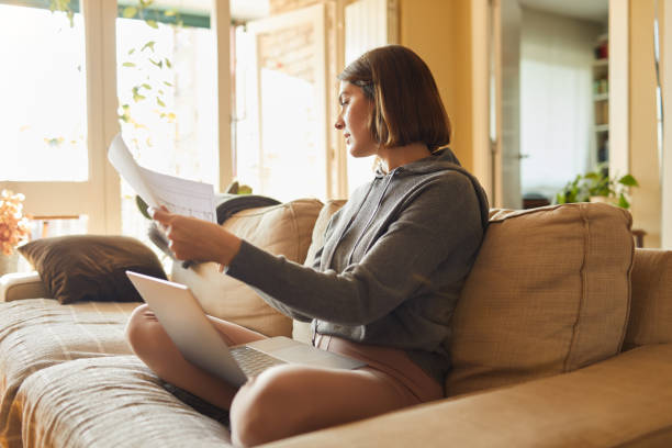 istock One woman working living room 1313300272