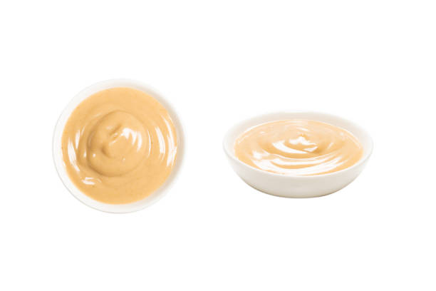 istock Mushroom sauce in a bowl isolated on white background. 1313301963