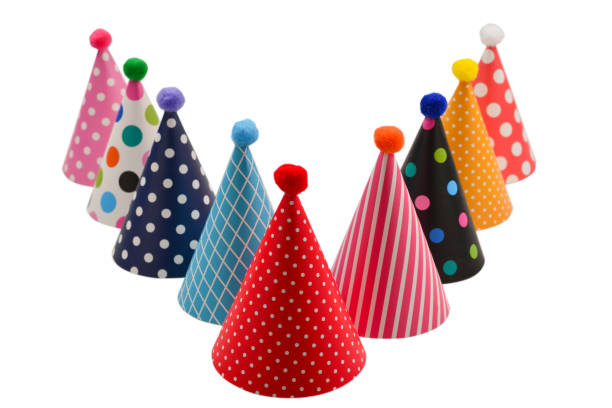 istock Colorful birthday caps on a white background. 1313301976
