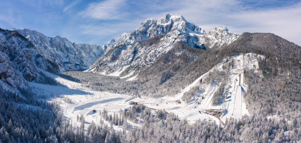 Ski Jump Planica at winter in Slovenia Aerial view of Ski Jump in Planica, Slovenia at Ratece near Kranjska gora in winter with snow. julian alps stock pictures, royalty-free photos & images