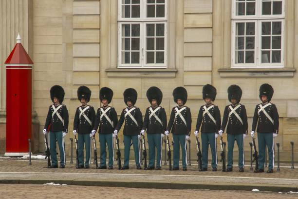 The change of the guard is normally a popular event but due to the Covid-19, the square is almost empty. The royal palace Amalienborg in Copenhagen consists of four almost identical buildings which are homes for different parts of the royal family. The buildings are constructed in the period 1750-1760 and where originally used for well off families but after the burn of Christiansborg they where acquired for royal use in 1794