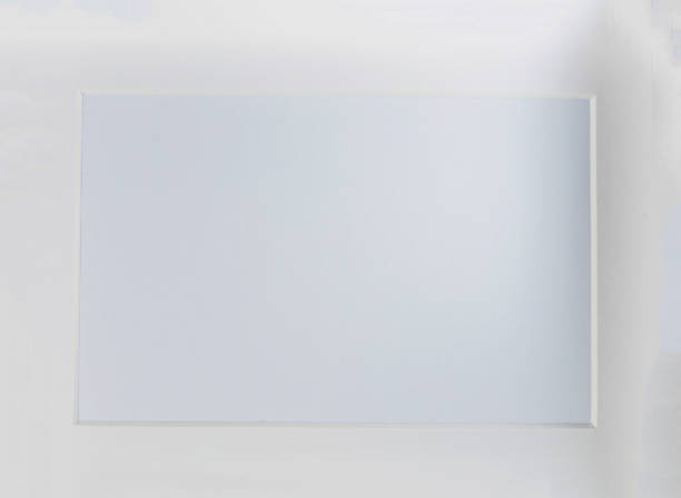 istock Picture frame with wooden frame photographed frontally in the studio with shadows 1313306813