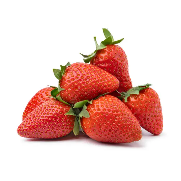 Photo of Heap of fresh picked red strawberries isolated on white background