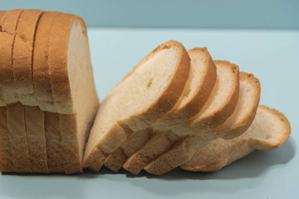 istock Sandwich bread on the bluish background. Wheat bread 1313311040
