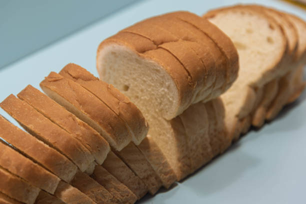 istock Sandwich bread on the bluish background. Wheat bread 1313311063