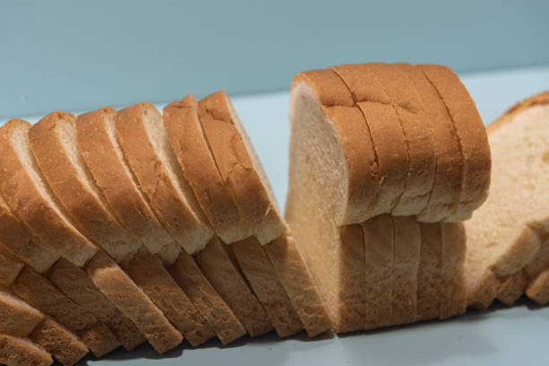 istock Sandwich bread on the bluish background. Wheat bread 1313311070