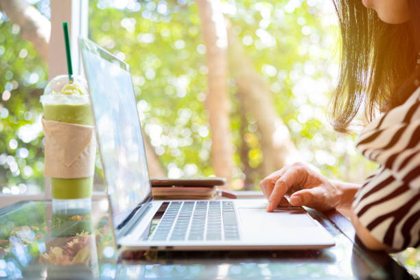 istock Successful businessman working in cafe during coffee break, Closeup of man's hands using modern laptop 1313313264