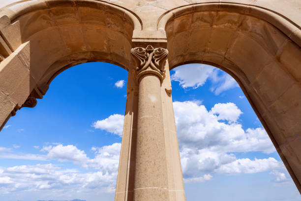istock View from the arches to the beautiful blue sky with white clouds 1313316354
