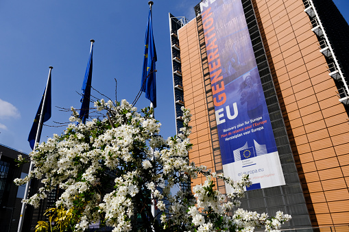 Blooming flowers in front of Berlaymont Building, the European Commission headquarters in the European district of Brussels, Belgium on April 19, 2021.
