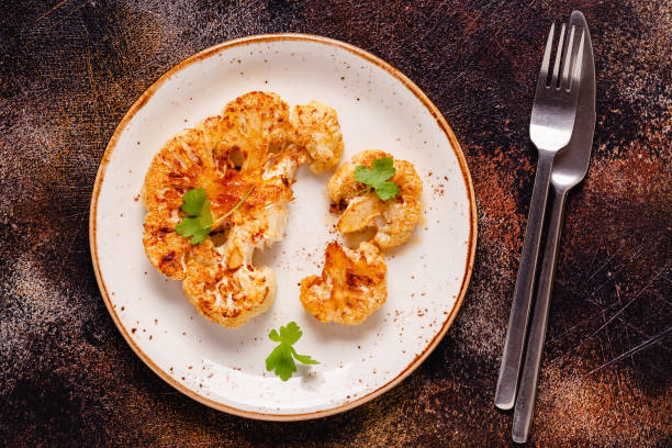 istock Cauliflower steak with spices cooked in the oven 1313319535