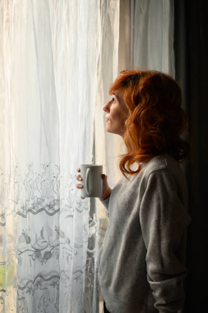 istock Woman drinking coffee in the morning 1313319720