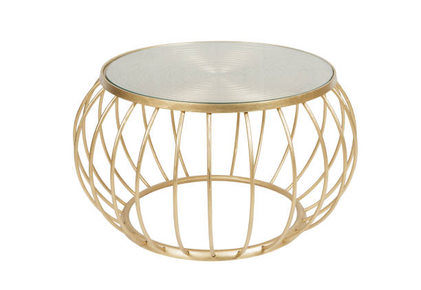 Modern golden round coffee table isolated on background