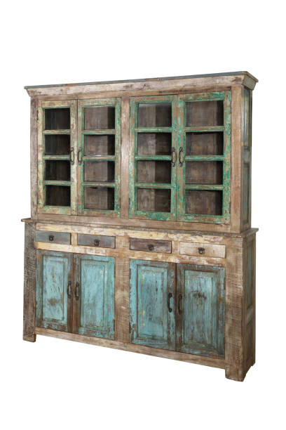 Vintage grungy wooden cabinet isolated on white background Vintage rustic wooden cabinet isolated on white background white shabby chic desk stock pictures, royalty-free photos & images