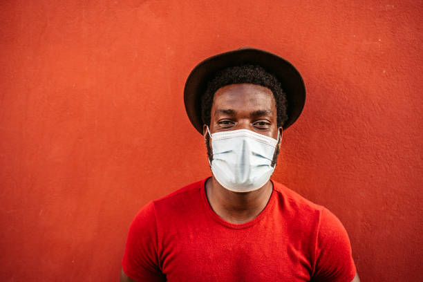 istock Young man wearing face mask 1313328582